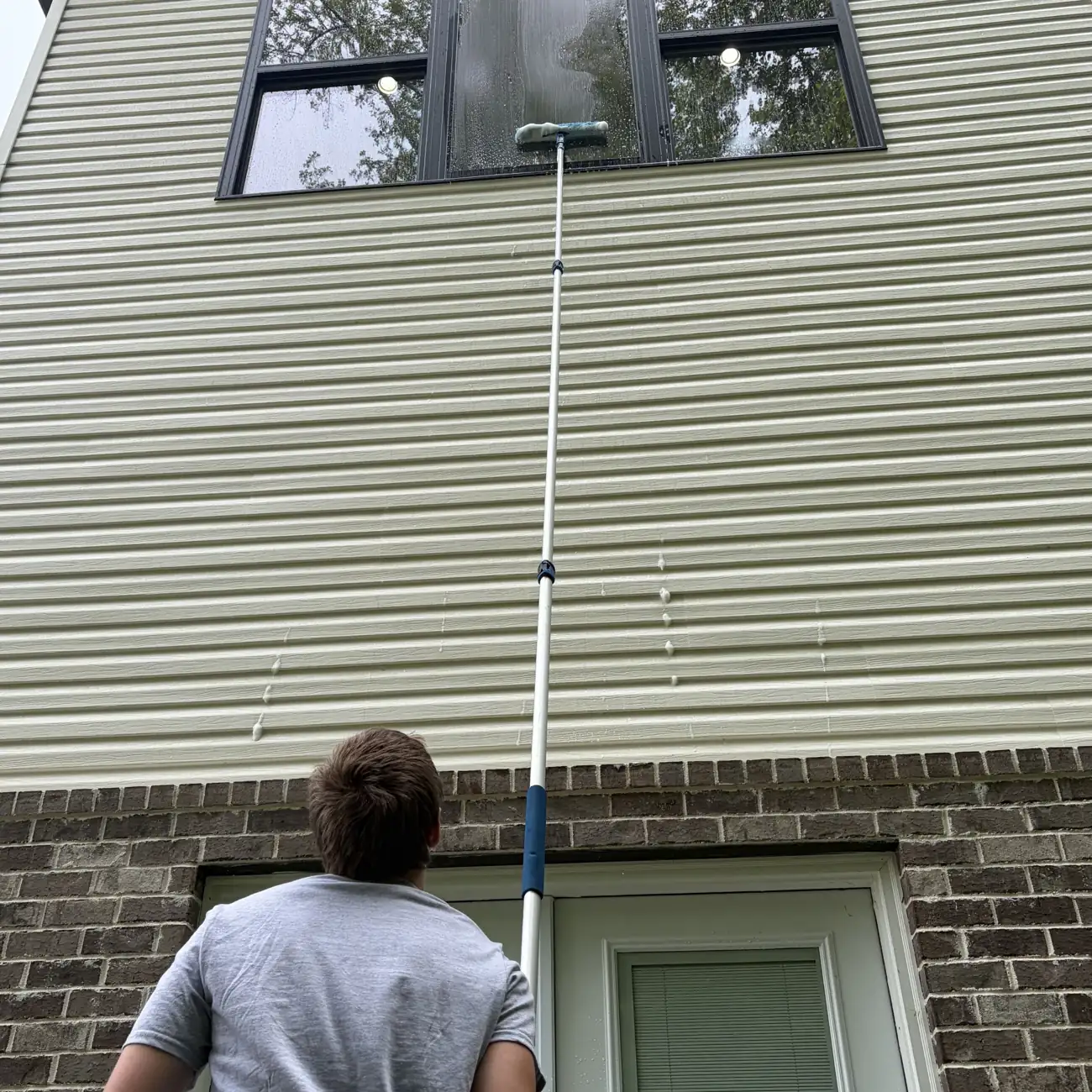The owner washing a house in East Tennessee